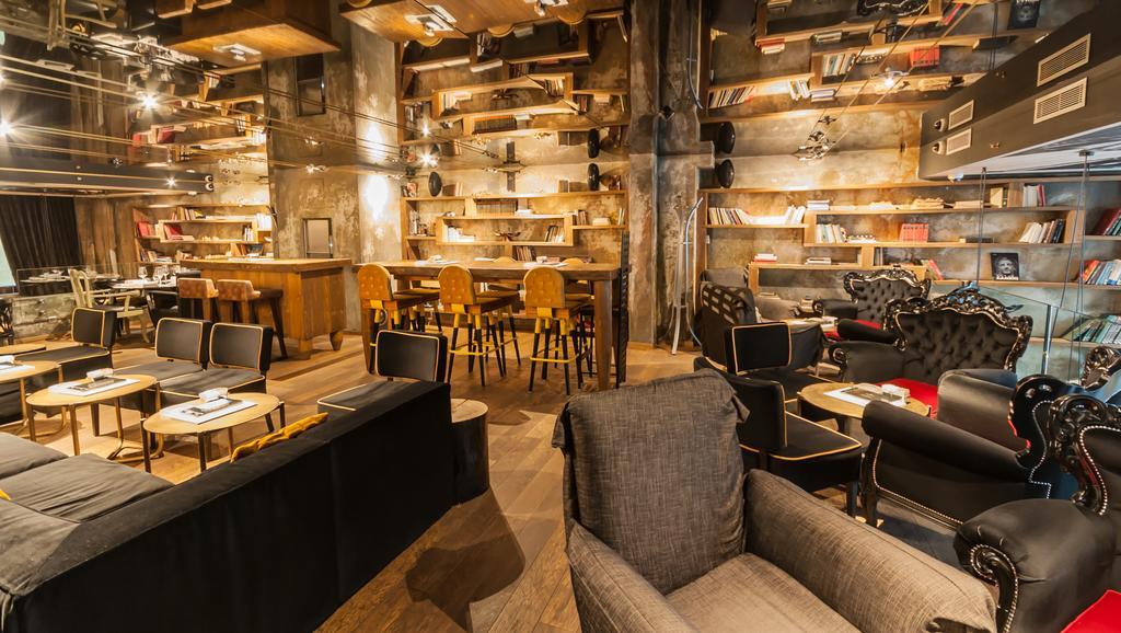 Hotel Hemera Podgorica Exterior photo Interior of a Starbucks Reserve store in Milan, Italy
