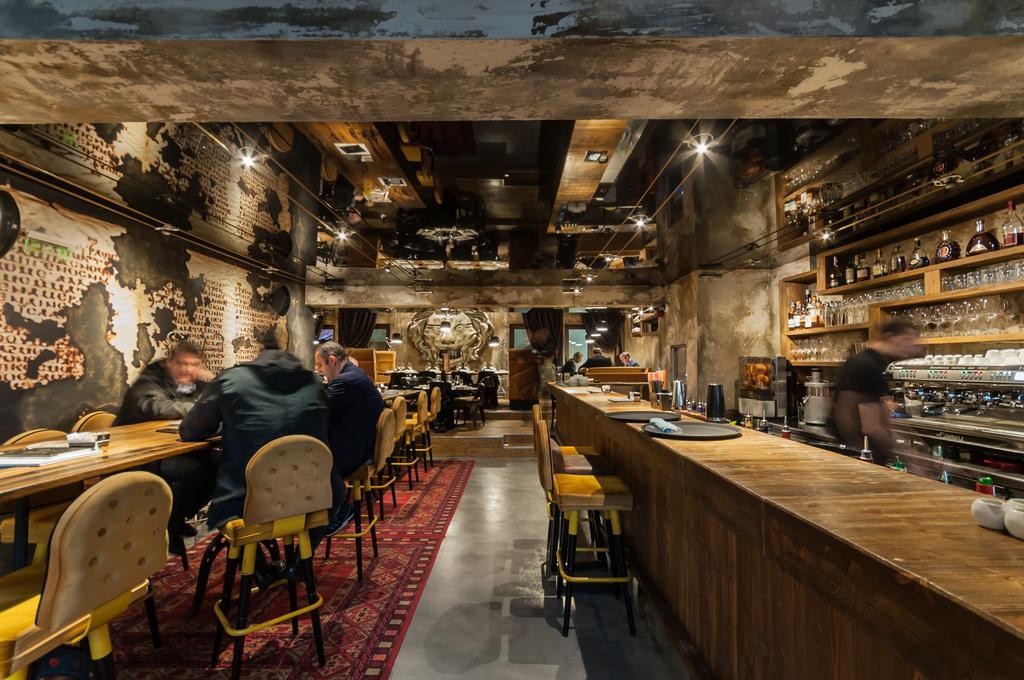 Hotel Hemera Podgorica Exterior photo Interior of a Starbucks Reserve store in Milan, Italy